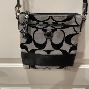 Coach Crossbody, Black and Gray, Black patent zipper pull and hinges.